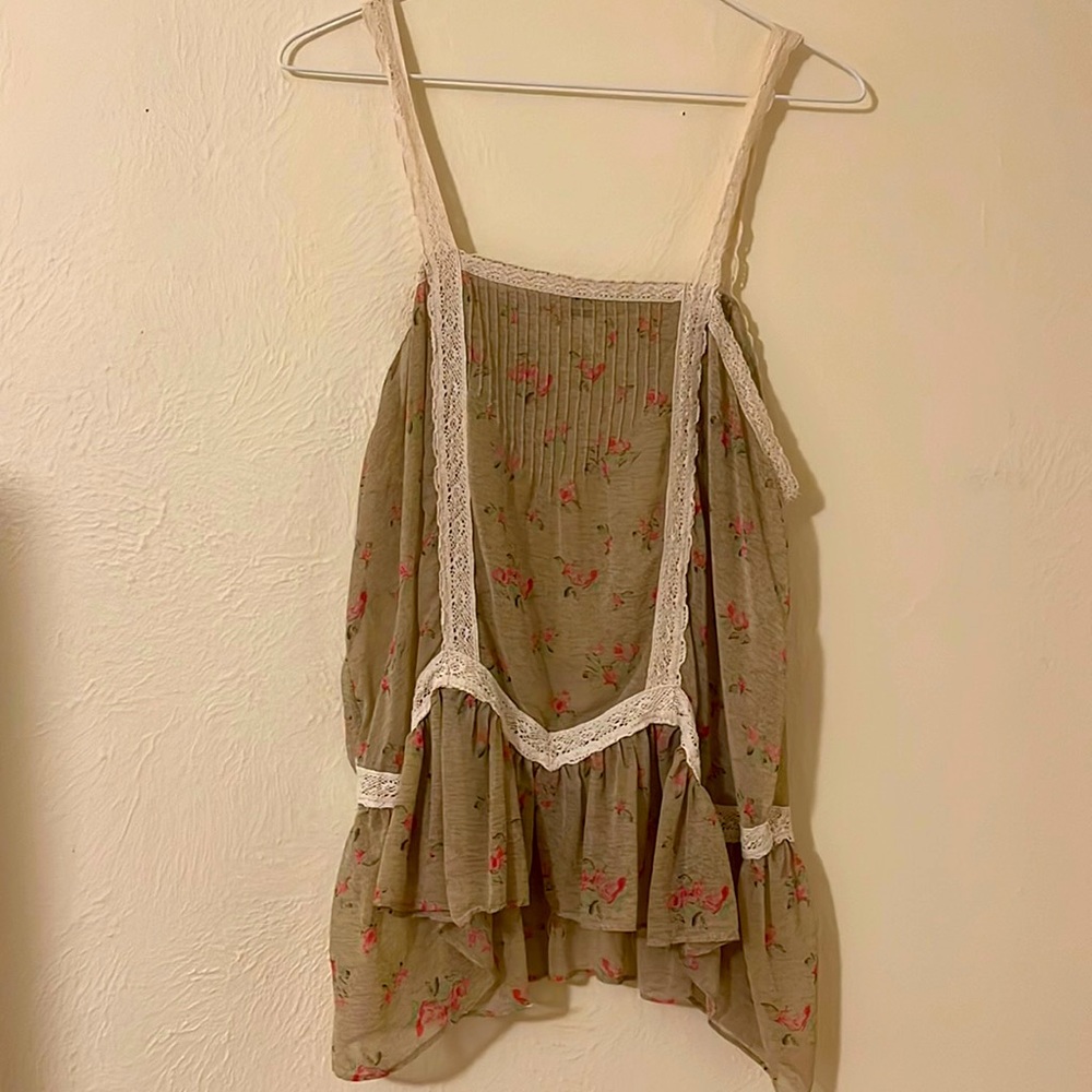 Beautiful floral and lace top. Free People